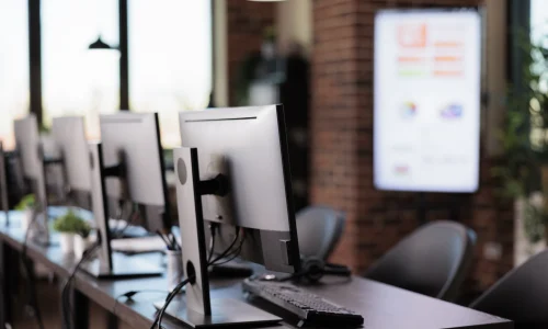 nobody-office-with-multiple-monitors-customer-service-desk-call-center-helpline-support-give-telecommunication-assistance-empty-helpdesk-with-client-telephony-reception.jpg